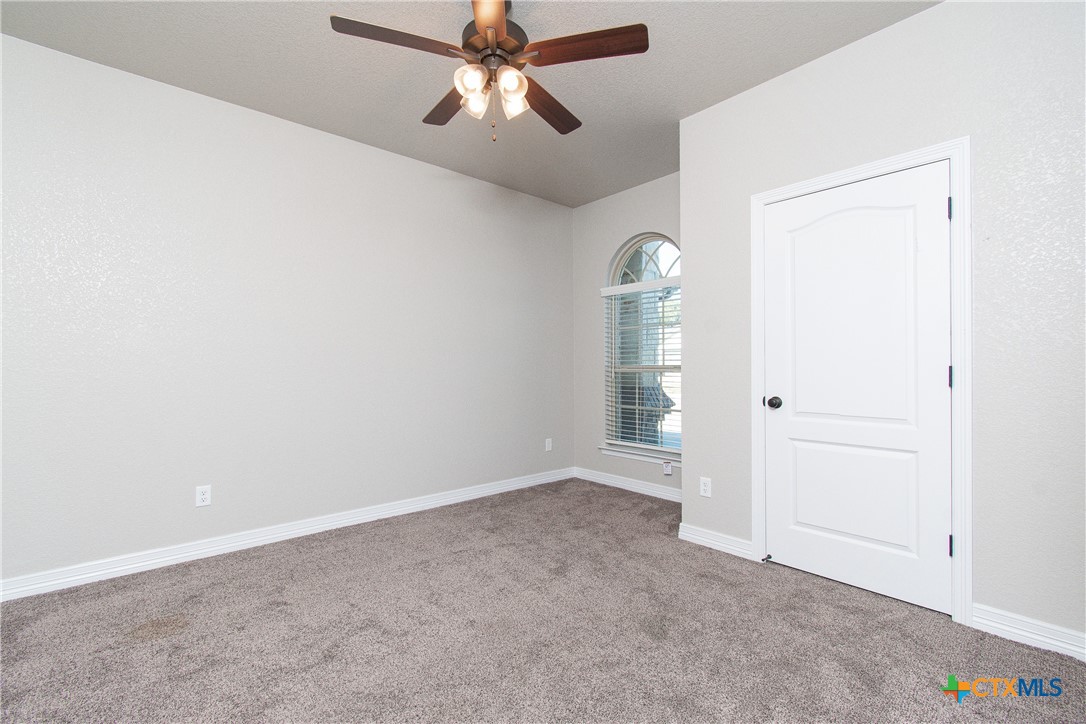 8101 Tenley Way Killeen, TX 76542 - Photo 24 of 29 an empty room with closet and windows