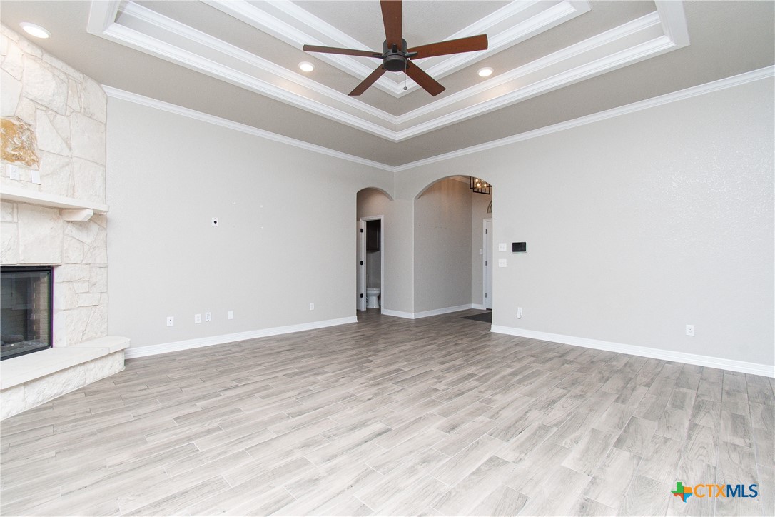 8101 Tenley Way Killeen, TX 76542 - Photo 4 of 29 a view of empty room with wooden floor and ceiling fan