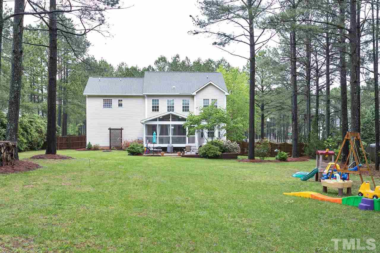 1813 Foxbrook Drive Raleigh, NC 27603 - Photo 22 of 23 Look at all the space in the back yard. Perfect for the family pet to run and play or for anyone to kick a ball.
