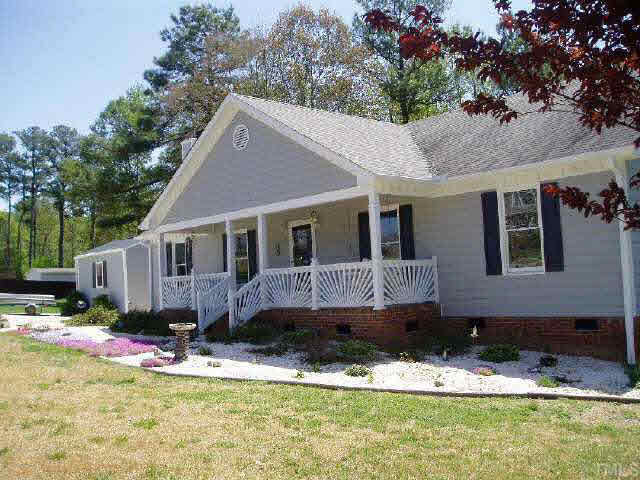 612 Trunecek Circle Raleigh, NC 27603 - Photo 2 of 9 a view of a house with a yard swimming pool and a yard