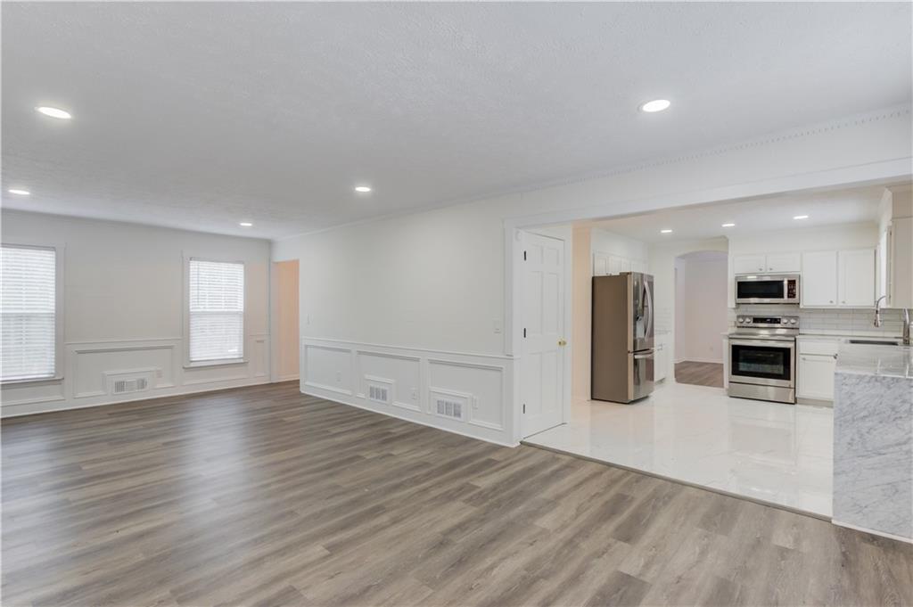 313 Summit Ridge Drive Lawrenceville, GA 30046 - Photo 13 of 42 a view of kitchen with wooden floor
