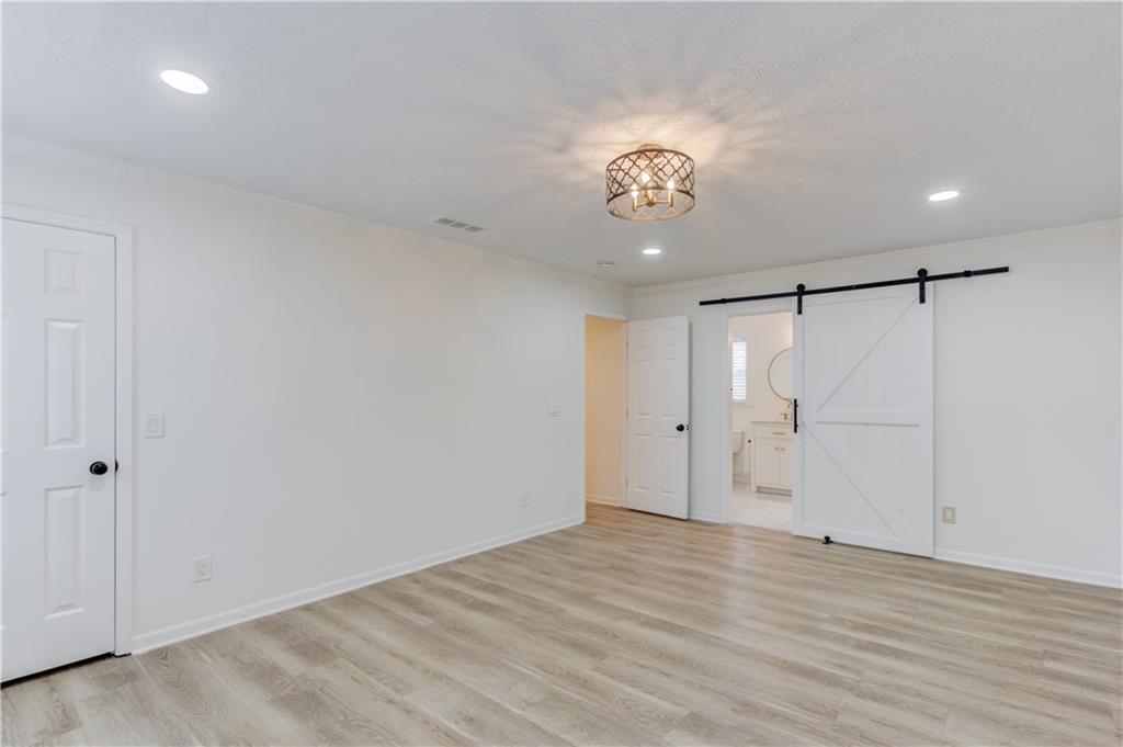 313 Summit Ridge Drive Lawrenceville, GA 30046 - Photo 19 of 42 an empty room with a empty space and a ceiling fan