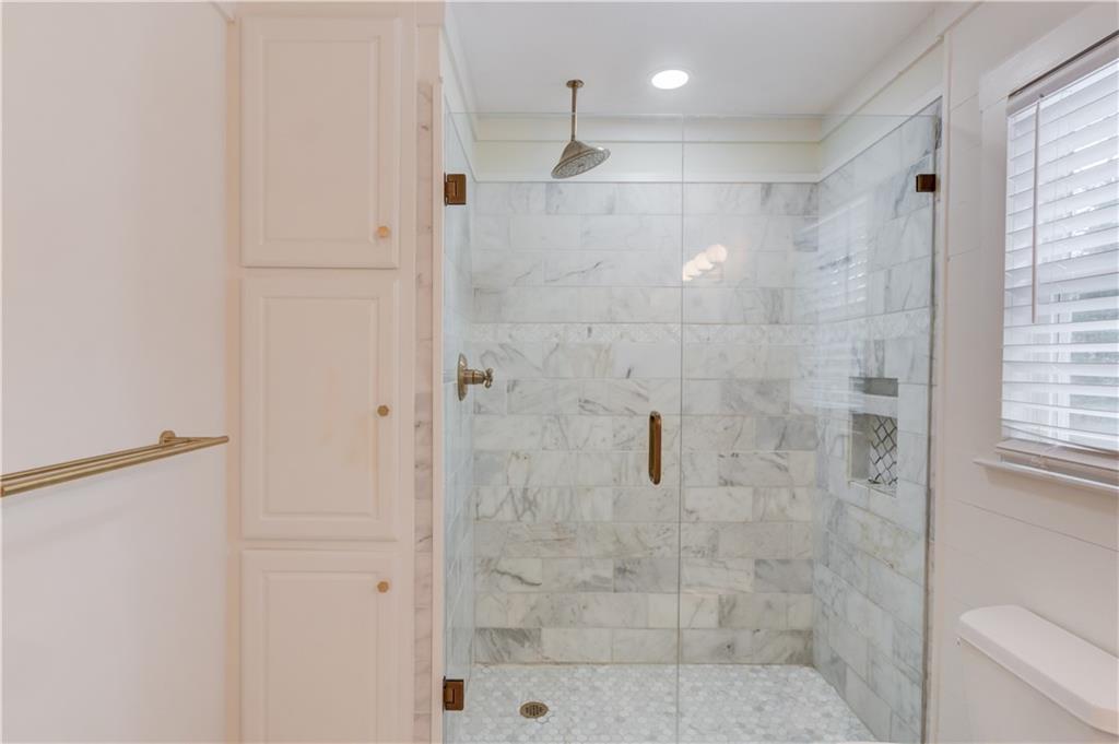 313 Summit Ridge Drive Lawrenceville, GA 30046 - Photo 20 of 42 a bathroom with a shower