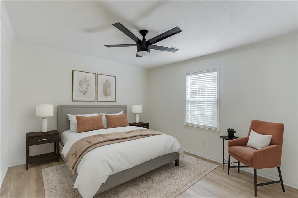 313 Summit Ridge Drive Lawrenceville, GA 30046 - Photo 21 of 42 a bedroom with a bed and a window