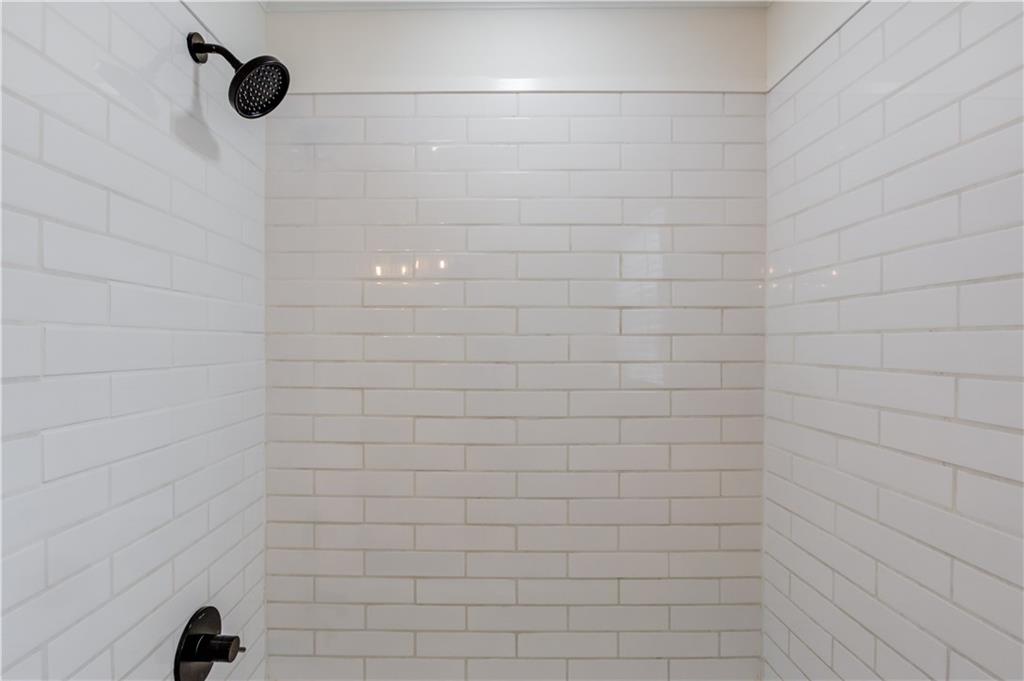 313 Summit Ridge Drive Lawrenceville, GA 30046 - Photo 24 of 42 a bathroom with a shower