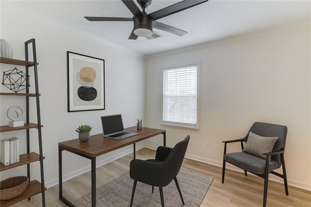 313 Summit Ridge Drive Lawrenceville, GA 30046 - Photo 26 of 42 a view of a workspace with furniture and a window