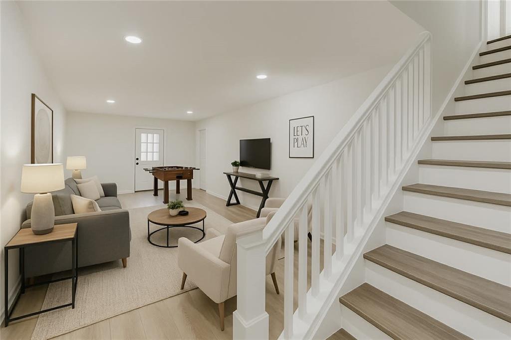 313 Summit Ridge Drive Lawrenceville, GA 30046 - Photo 28 of 42 a view of a livingroom with furniture and staircase