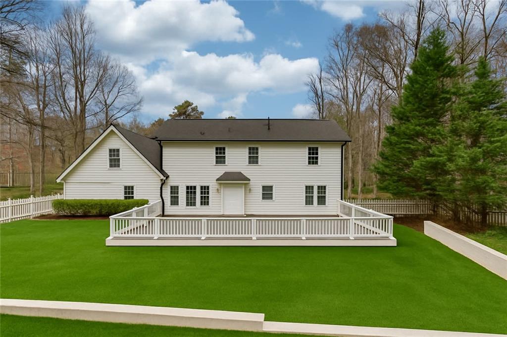 313 Summit Ridge Drive Lawrenceville, GA 30046 - Photo 38 of 42 a front view of a house with a yard
