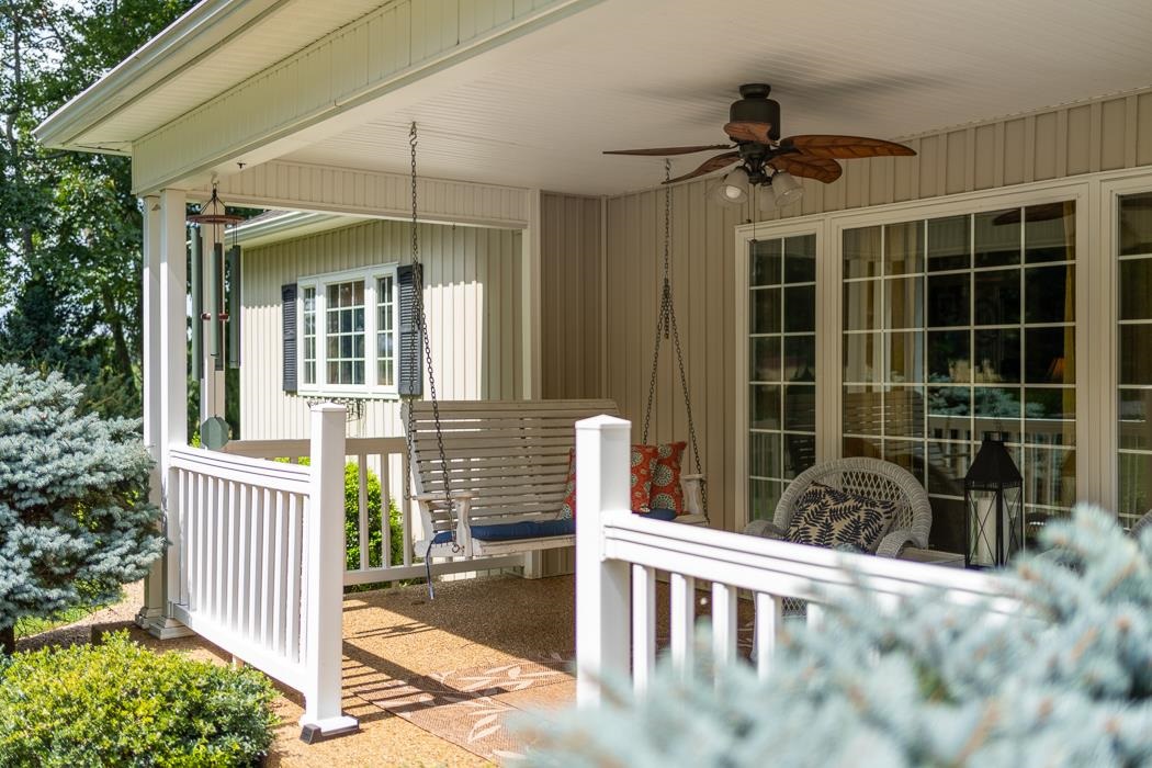 170 Old Back Road Raphine, VA 24472 - Photo 30 of 66 a view of a porch with a table and chairs