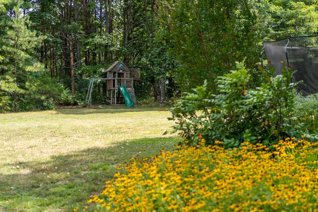 170 Old Back Road Raphine, VA 24472 - Photo 55 of 66 a view of a swimming pool with an outdoor space and seating area