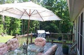 6115 Sharon Road Salisbury, NC 28147 - Photo 3 of 8 a view of a chair and table in the patio