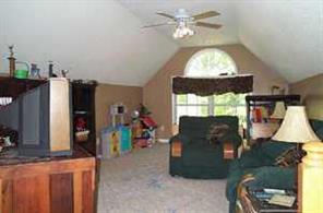 6115 Sharon Road Salisbury, NC 28147 - Photo 7 of 8 a living room with furniture and a chandelier