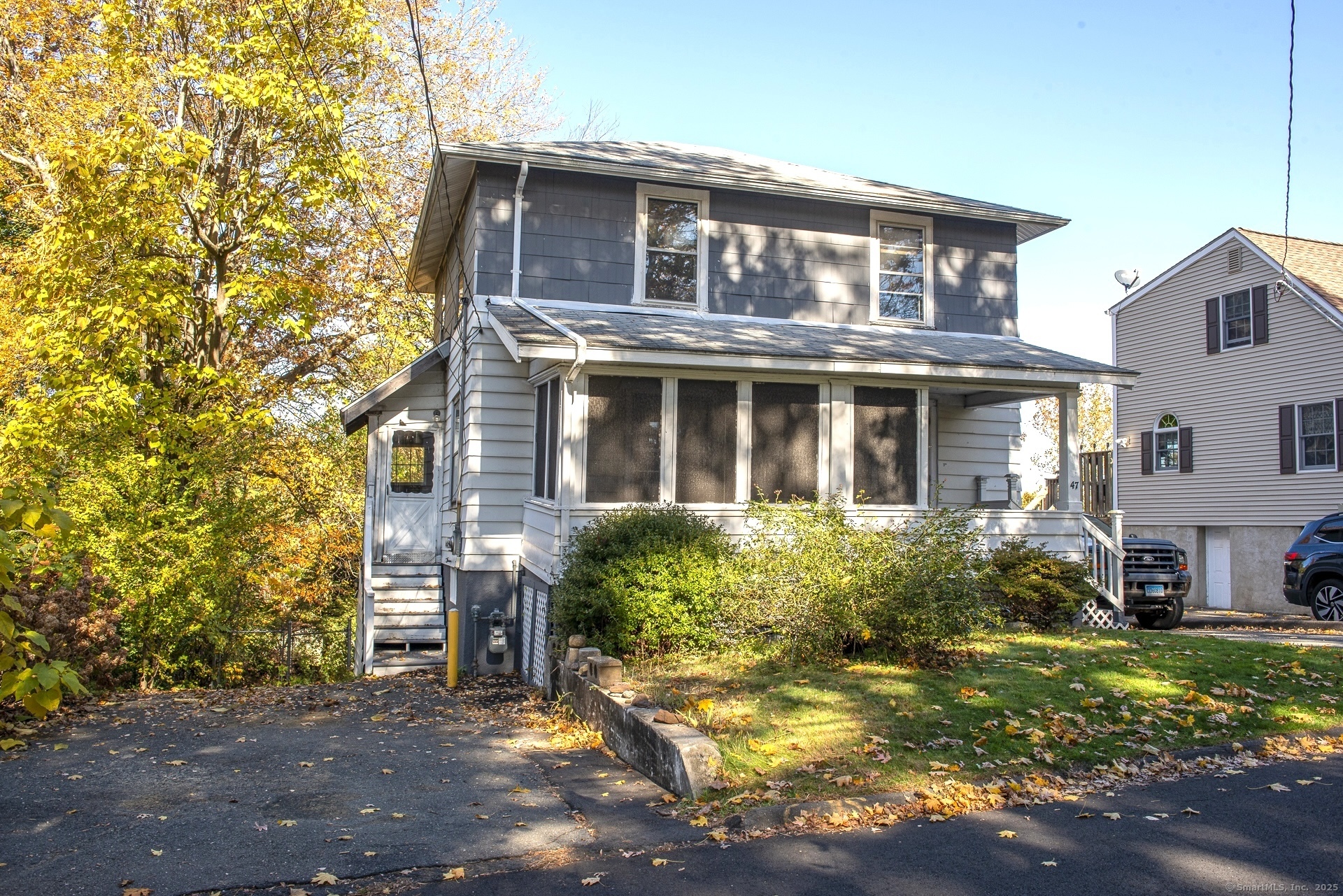 47 Meiklem Street Bristol, CT 06010 - Photo 1 of 1 a front view of a house with a yard