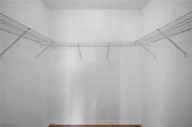 a view of a room with racks on the wall