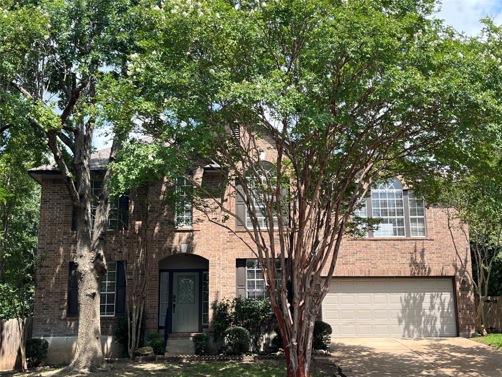 8104 Ephraim Road Austin, TX 78717 - Photo 1 of 1 a front view of a house with a yard