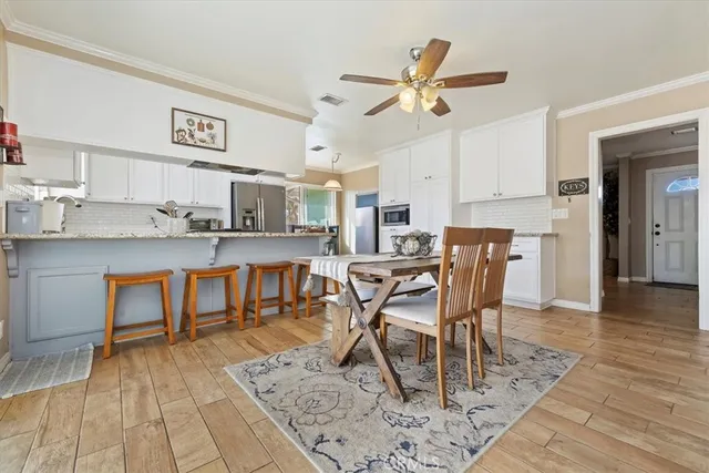 a view of a dining room with furniture
