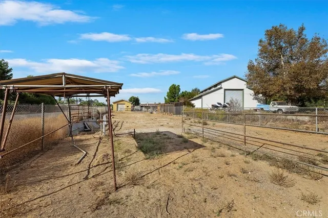 a view of a terrace with wooden fence