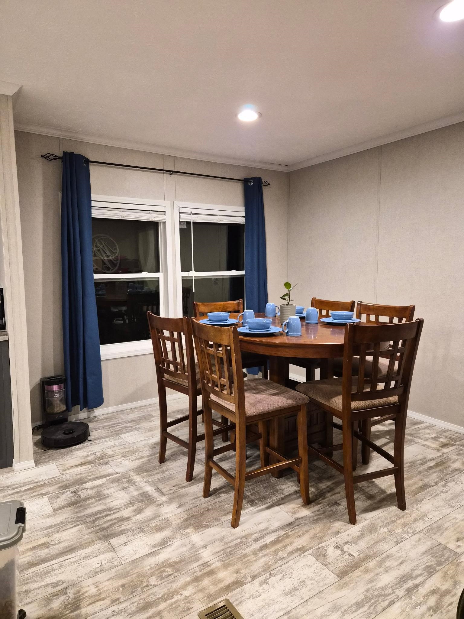 510 Potts Chapel Road Jackson, TN 38305 - Photo 12 of 30 Dining space with light wood finished floors, ornamental molding, and recessed lighting