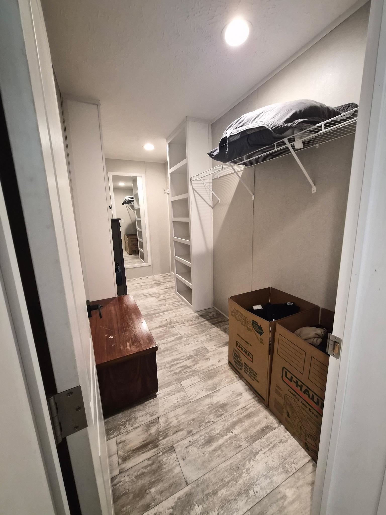 510 Potts Chapel Road Jackson, TN 38305 - Photo 19 of 30 Walk in closet with light wood-style floors