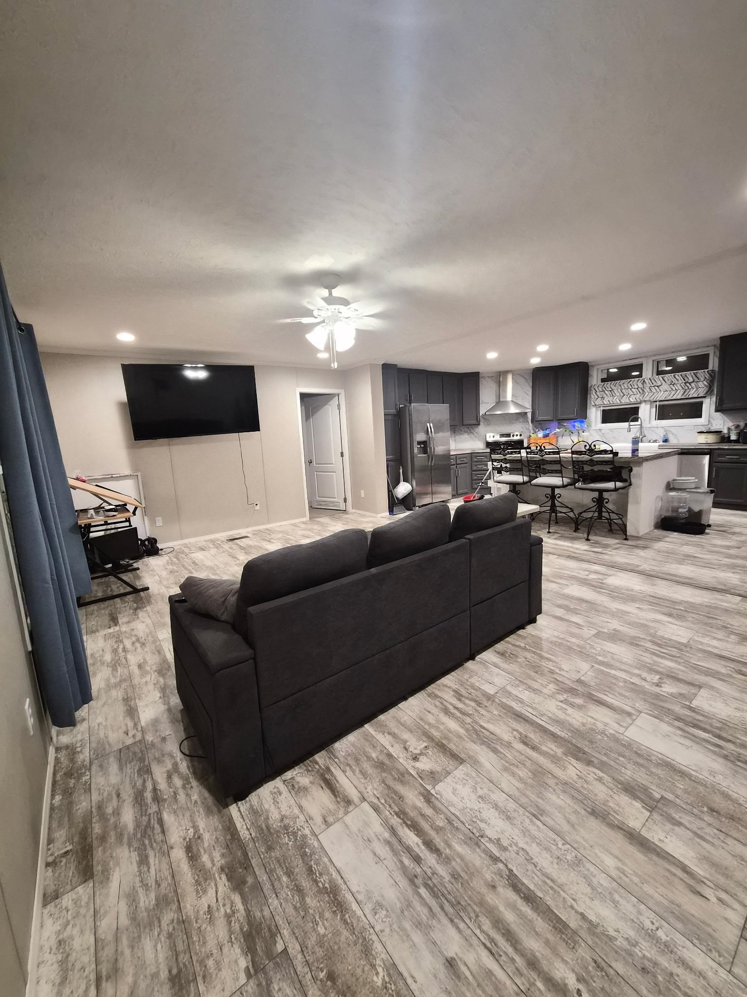 510 Potts Chapel Road Jackson, TN 38305 - Photo 8 of 30 Living area featuring recessed lighting, light wood finished floors, and ceiling fan