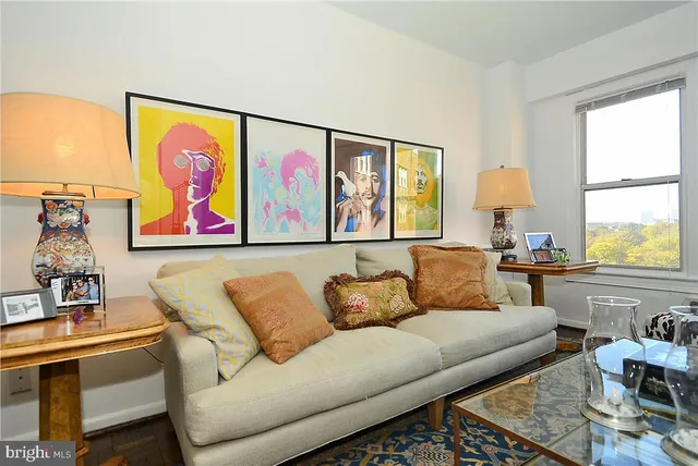 a living room with furniture and a window
