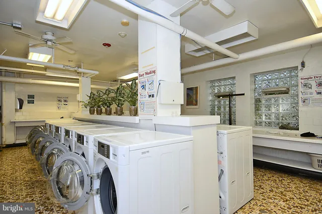 a view of roof deck with patio