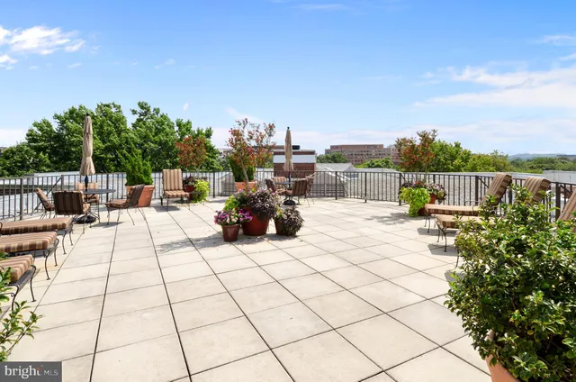 a view of a terrace with seating area