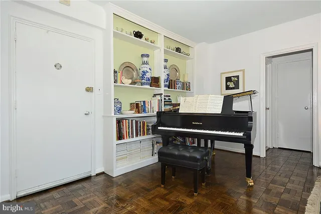 a view of a workspace with furniture