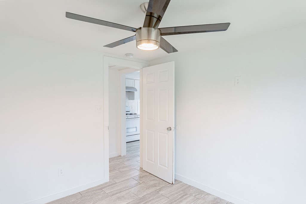 1307 Boulder Street Houston, TX 77012 - Photo 13 of 14 a view of a hallway with wooden floor
