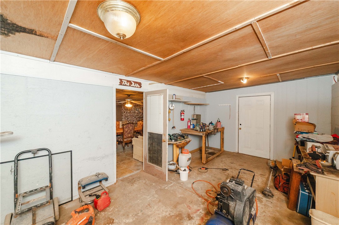 1692 South Verde Road Golden Valley, AZ 86413 - Photo 10 of 39 This work shop leads to game room