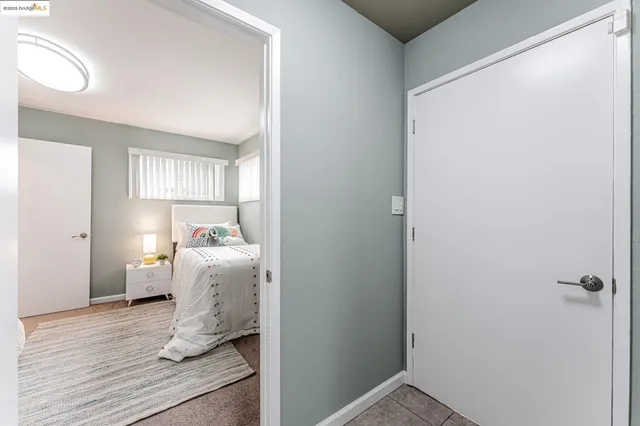 a room that has a window and a wooden floor
