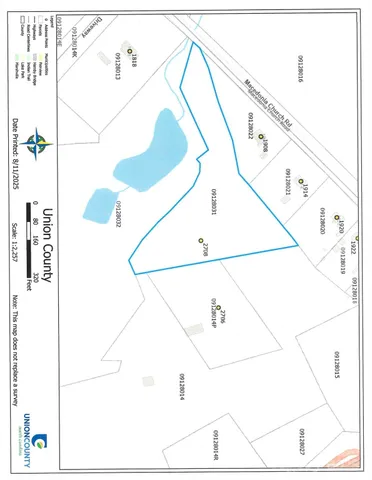 a picture of a bathroom with a white wall and white walls