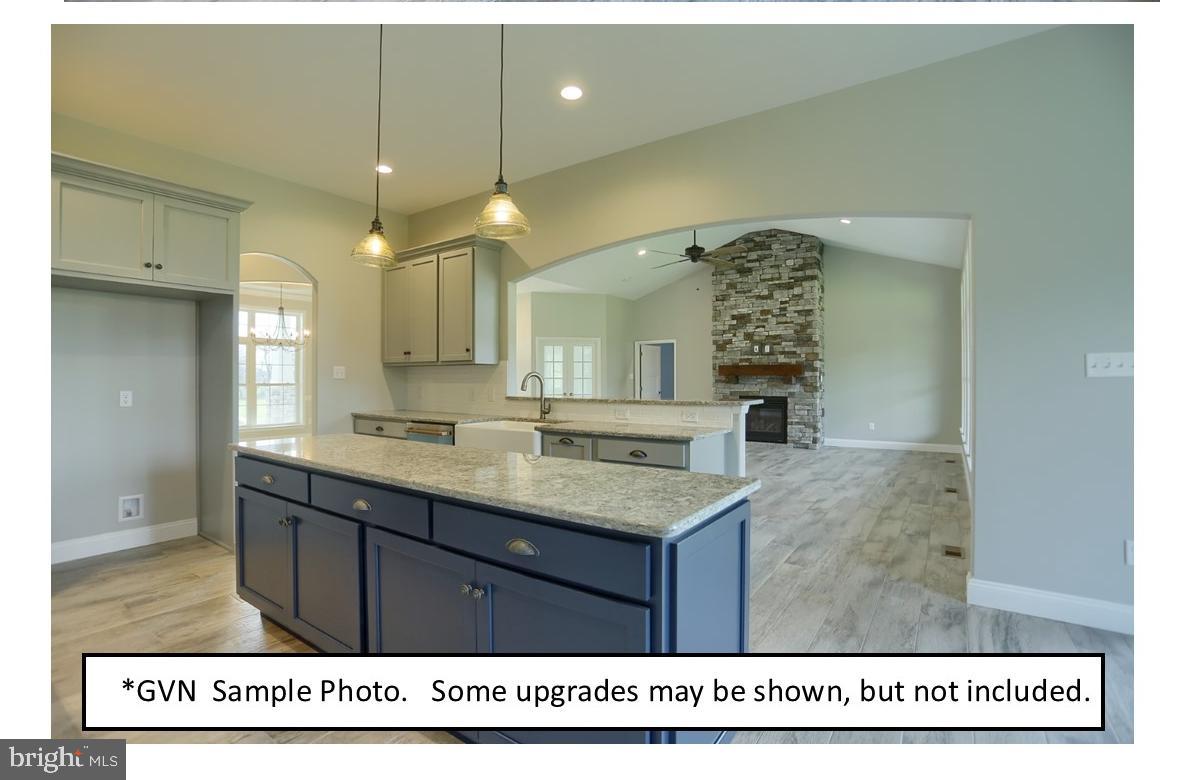 29 Fiorino Way Sinking Spring, PA 19608 - Photo 7 of 12 a bathroom with a sink a mirror and a shower