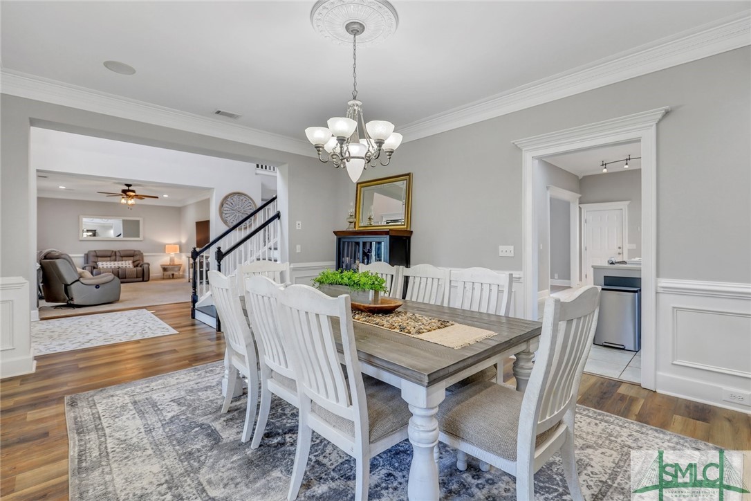 803 Honey Ridge Road Guyton, GA 31312 - Photo 14 of 50 The 18' X 12'11 dining room has plenty of room for