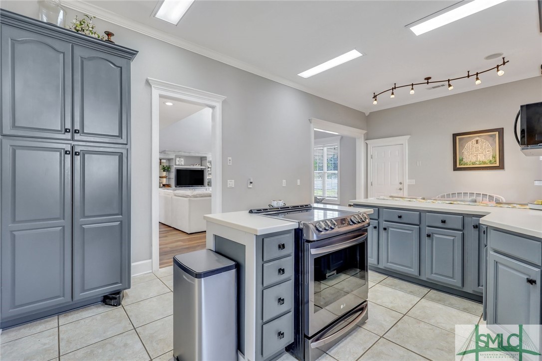 803 Honey Ridge Road Guyton, GA 31312 - Photo 16 of 50 You will love the expansive kitchen with work stat