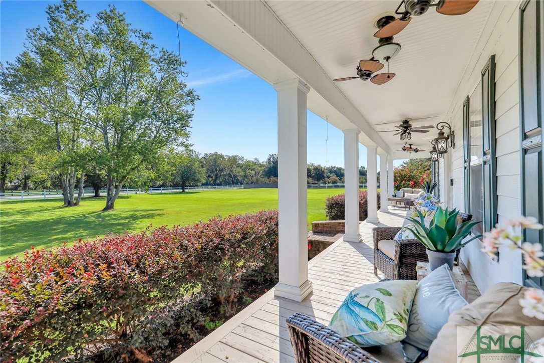 803 Honey Ridge Road Guyton, GA 31312 - Photo 4 of 50 Spacious covered front porch with relaxing views