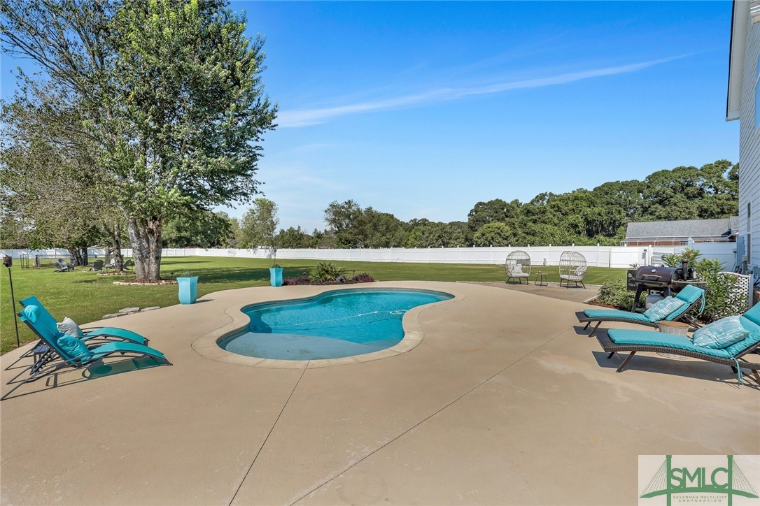 803 Honey Ridge Road Guyton, GA 31312 - Photo 42 of 50 Enjoy your own back yard oasis with this inviting