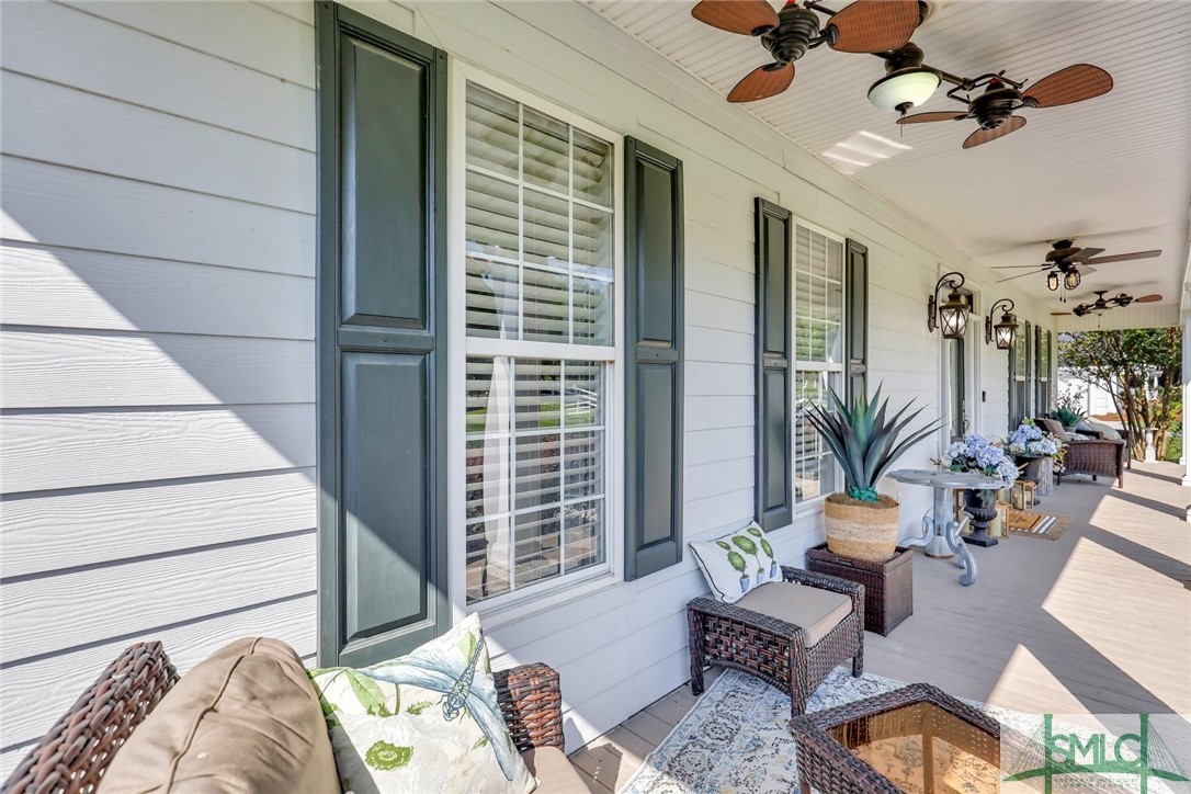 803 Honey Ridge Road Guyton, GA 31312 - Photo 5 of 50 Porch is width of home