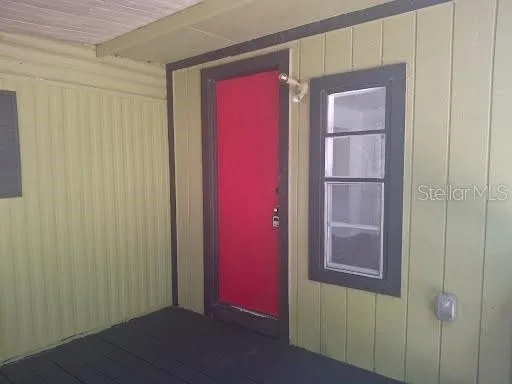 a view of a small space with a door