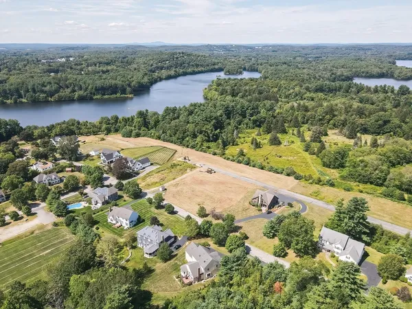 a view of a lake with a big yard