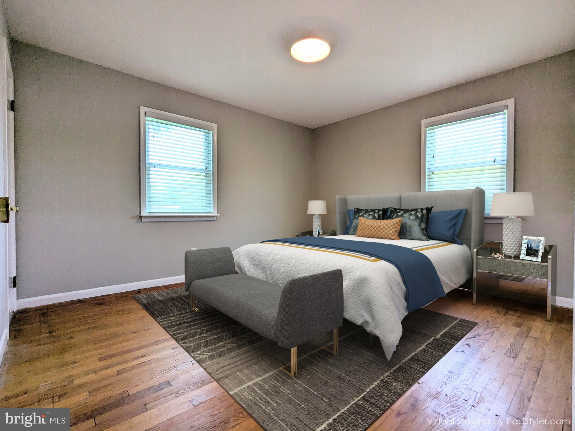 24675 Blackistone Road Hollywood, MD 20636 - Photo 12 of 27 a bedroom with bed and window