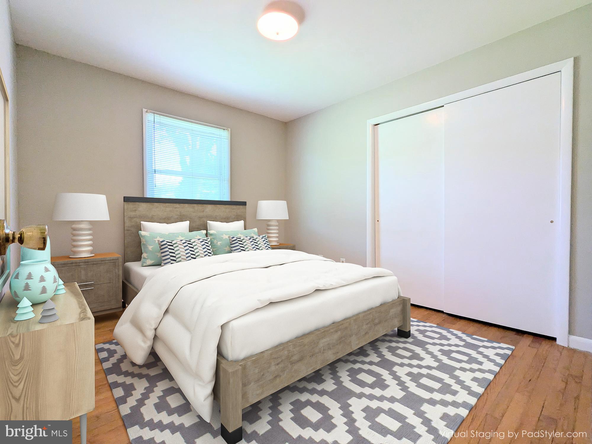 24675 Blackistone Road Hollywood, MD 20636 - Photo 16 of 27 a bedroom with a bed and a window