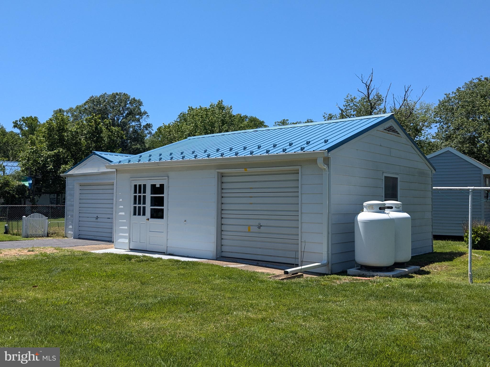 24675 Blackistone Road Hollywood, MD 20636 - Photo 26 of 27 a view of a backyard with potted plants