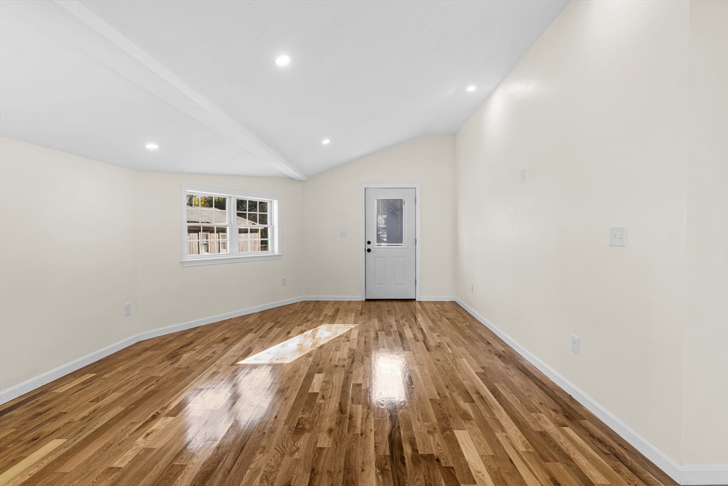 12 Sylvan Road Norton, MA 02766 - Photo 11 of 39 a view of room with wooden floor and window