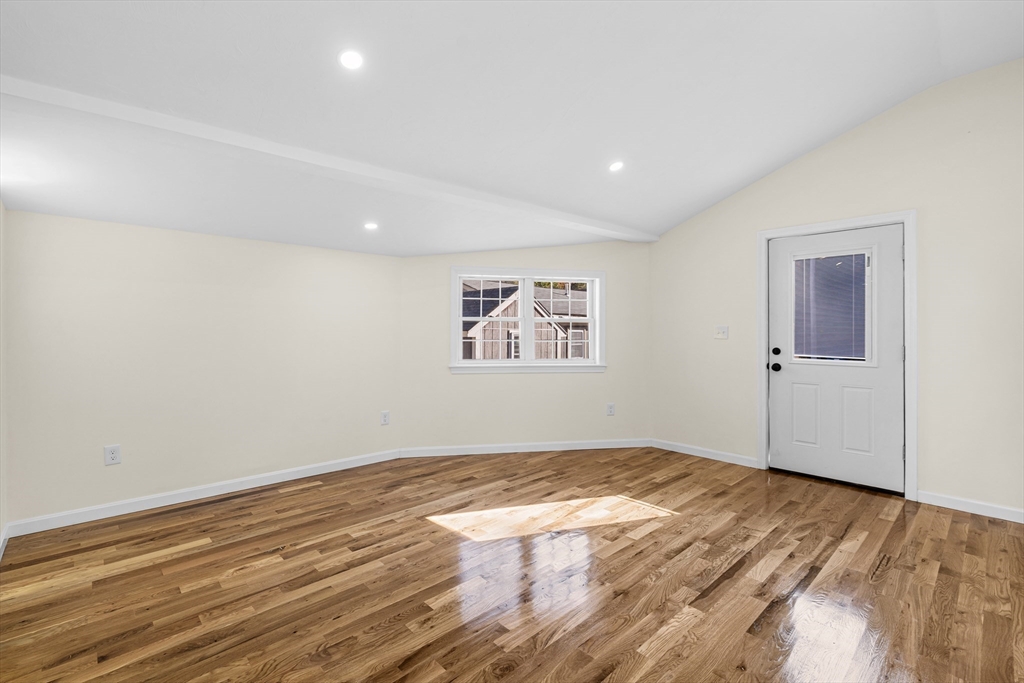 12 Sylvan Road Norton, MA 02766 - Photo 12 of 39 a view of empty room with wooden floor