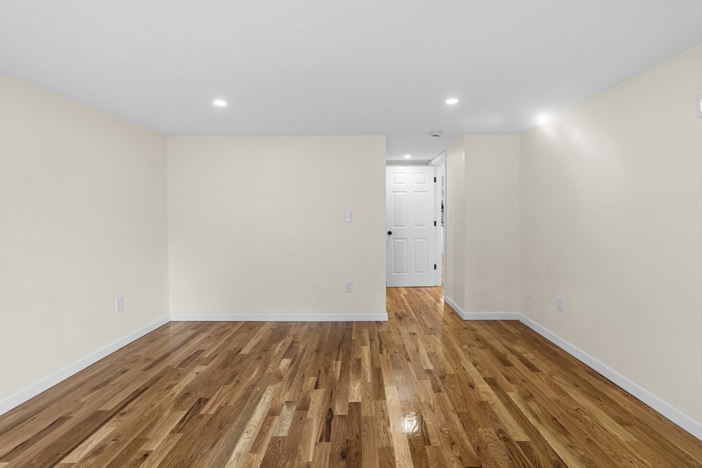 12 Sylvan Road Norton, MA 02766 - Photo 18 of 39 a view of empty room with wooden floor