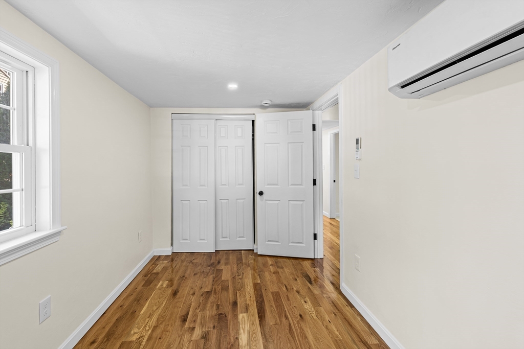 12 Sylvan Road Norton, MA 02766 - Photo 26 of 39 a view of a room with wooden floor and white walls