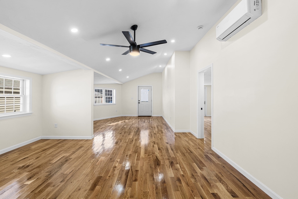 12 Sylvan Road Norton, MA 02766 - Photo 10 of 39 a view of empty room with wooden floor