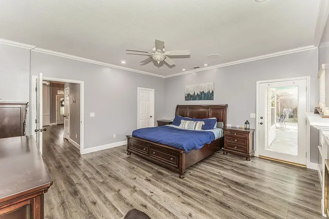 a bedroom with a bed and a bookshelf