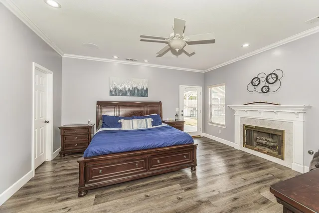 a spacious bathroom with a granite countertop sink mirror and